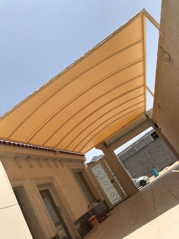 صورة توضيحية لأعمال مظلات سيارات